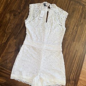Bebe lace romper NWT
